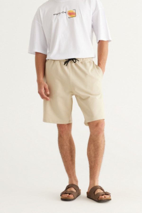 AC&Co / Altınyıldız Classics AC&Co / Altınyıldız Classics Men's Beige Standard Fit Normal Cut Cotton Flexible Knitted Shorts,