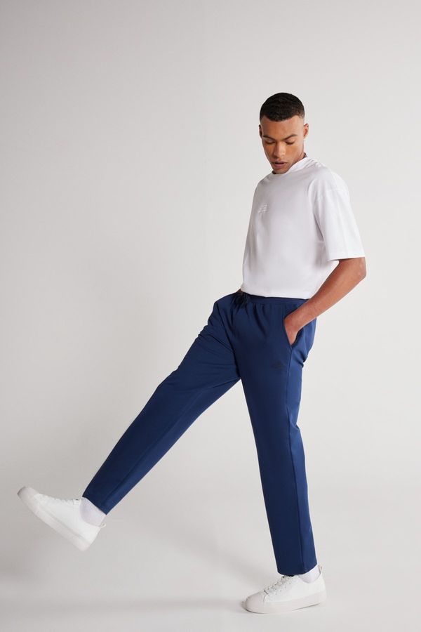 AC&Co / Altınyıldız Classics AC&Co / Altınyıldız Classics Unisex Indigo Standard Fit Normal Cut, Flexible Cotton Sweatpants with Pockets.