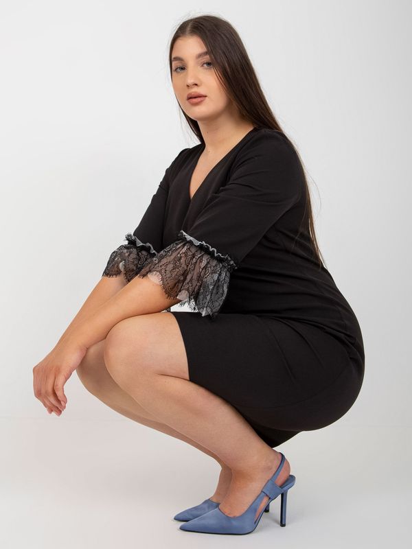 Fashionhunters Black elegant dress of large size with 3/4 sleeves