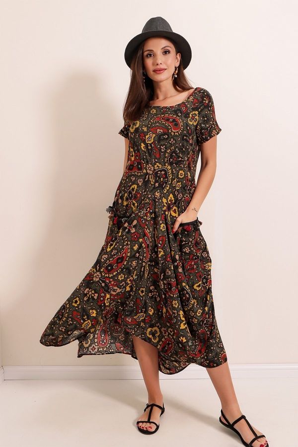 By Saygı By Saygı Floral Pattern Tasseled Double Pocketed Asymmetric Dress Khaki