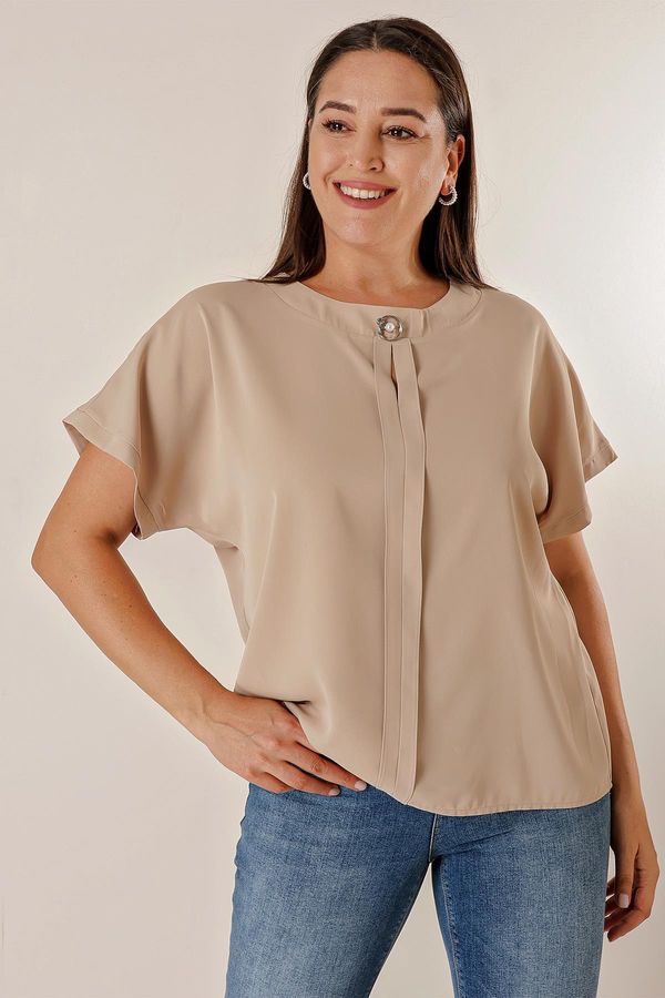 By Saygı By Saygı Plus Size Chiffon blouse with a brooch collar and a fly down the front. Short Bat Sleeves.
