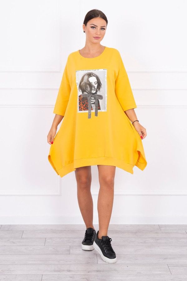 Kesi Dress with print and flowing bottom of mustard