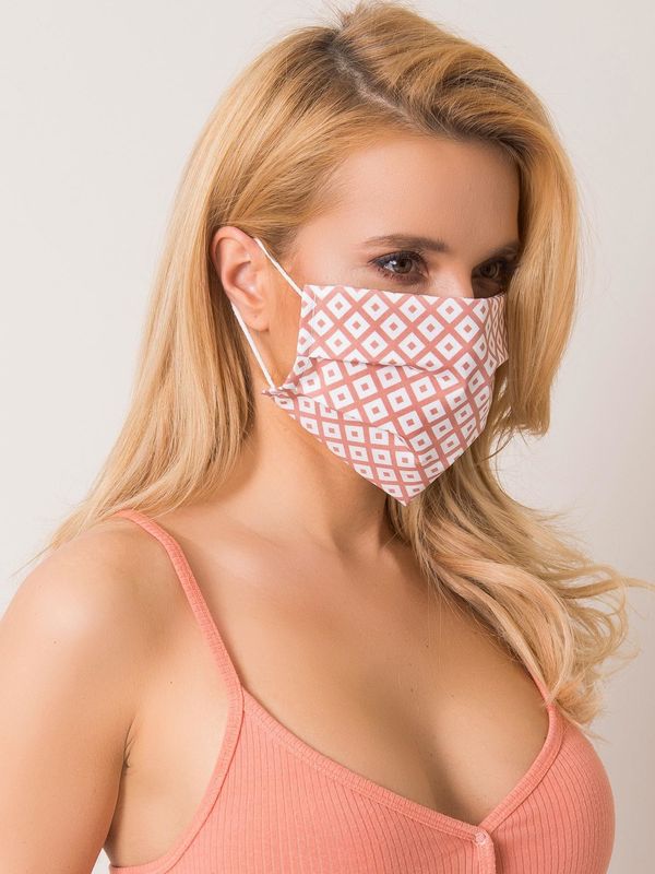 Fashionhunters Dusty pink protective mask with geometric patterns