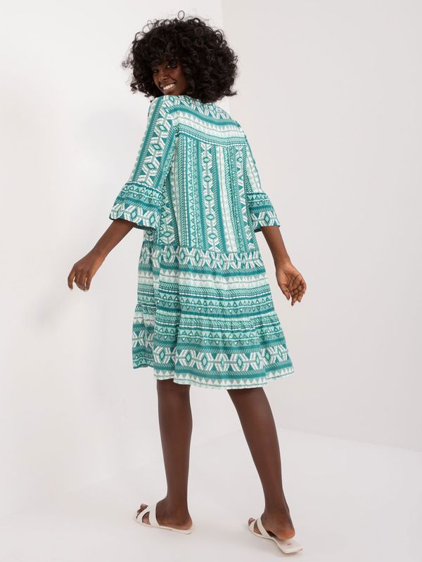Fashionhunters Green loose patterned dress with ruffles SUBLEVEL