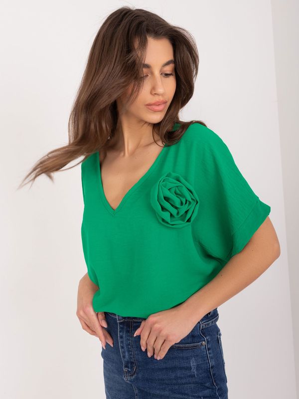 Fashionhunters Green women's oversize blouse with flower
