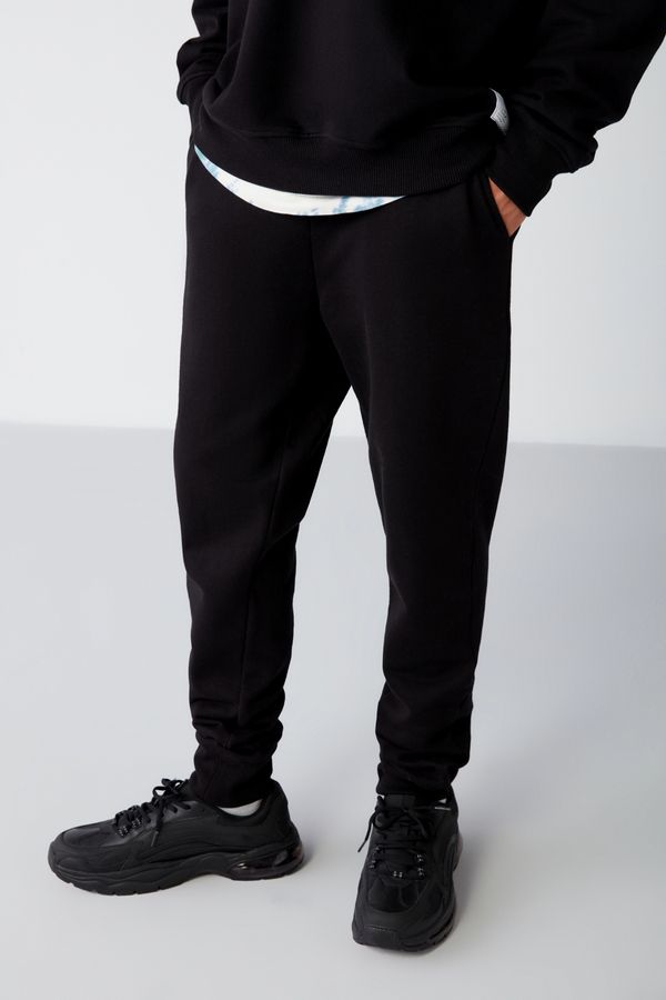 GRIMELANGE GRIMELANGE Jeremiah Men's Regular Leg Stretchy Fabric Black Sweatpants with Lanyard Waist and Elastic Pockets
