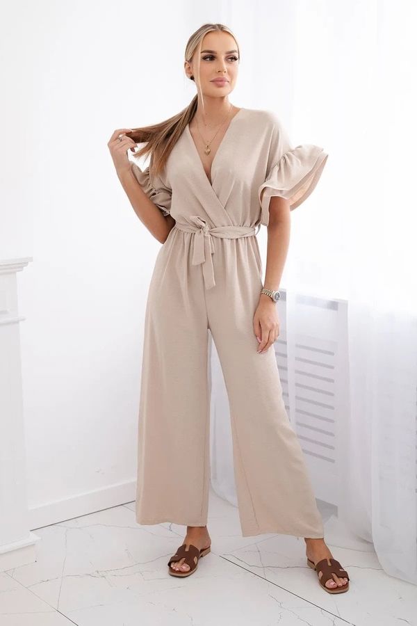 Kesi Jumpsuit with a tie at the waist with decorative sleeves in beige color