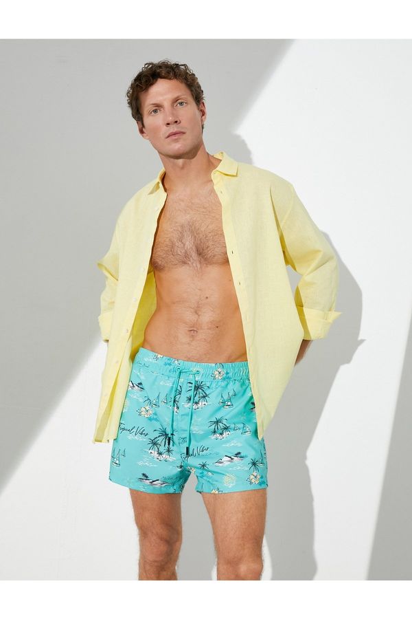 Koton Koton Beach Shorts Summer Theme with a drawstring waist and pockets.