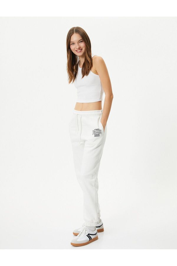 Koton Koton Jogger Sweatpants with Fastener at the Waist, Print Detailed with Pockets.