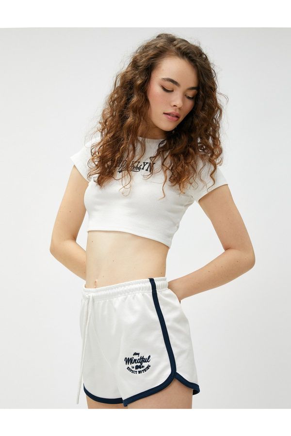 Koton Koton Mini Shorts with Lace-Up Waist and Embroidered Pile Detail.