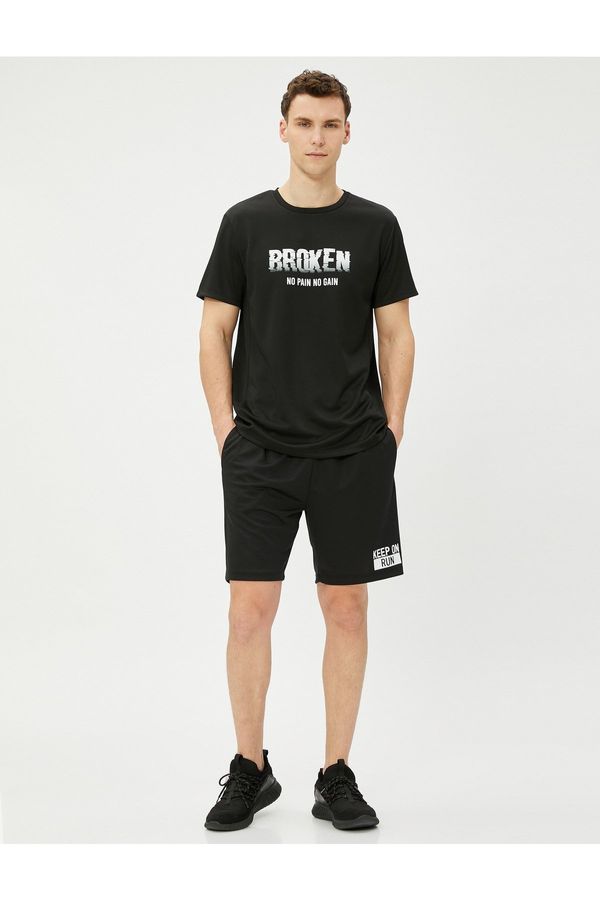 Koton Koton Sports T-Shirt with a slogan printed, short sleeves and a crew neck.