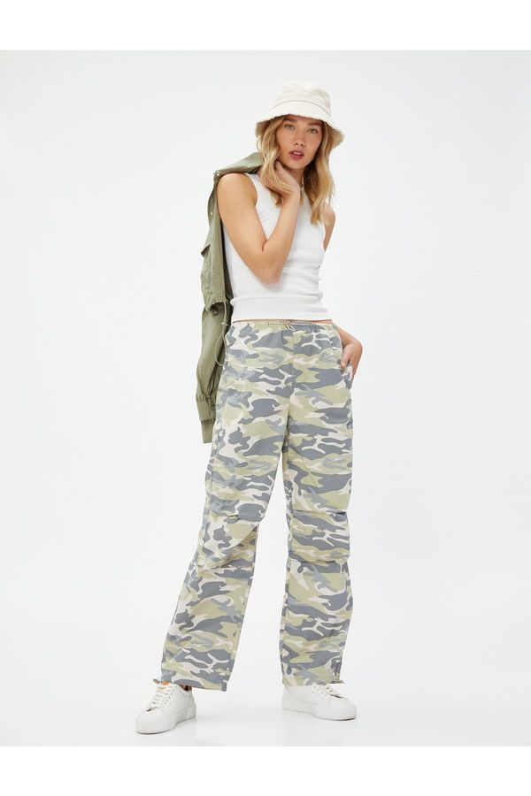 Koton Koton Trousers with Pocket Detail, Folded Waist, Elasticated, Stopper.