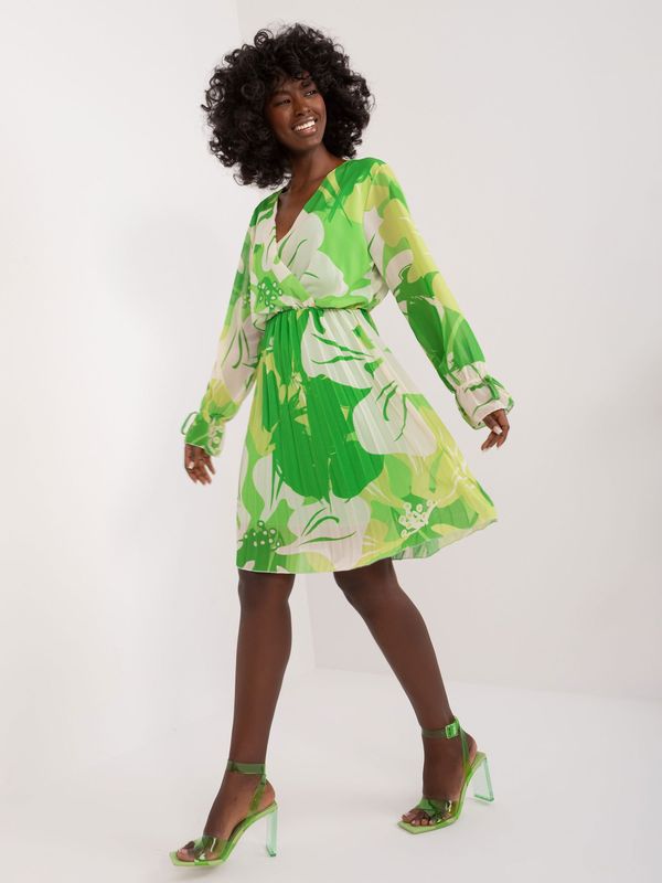 Fashionhunters Light green patterned pleated dress