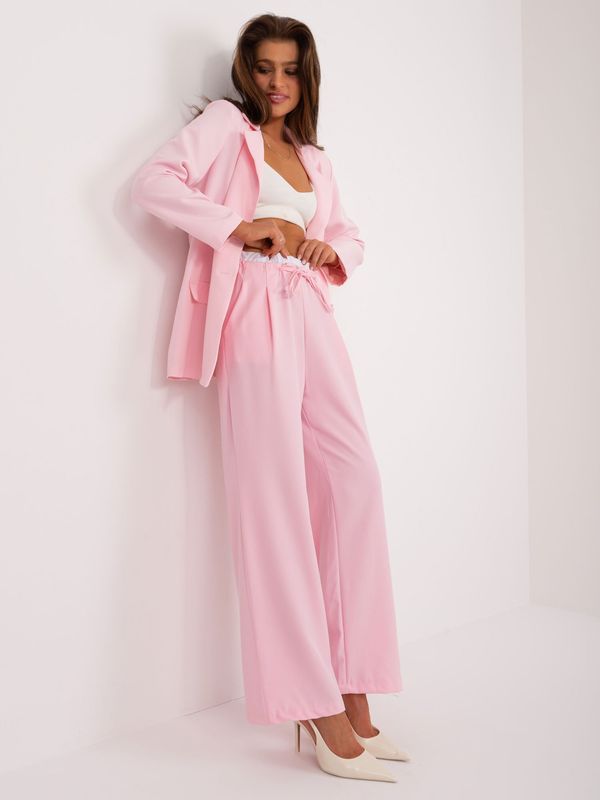 Fashionhunters Light pink suit trousers with pockets