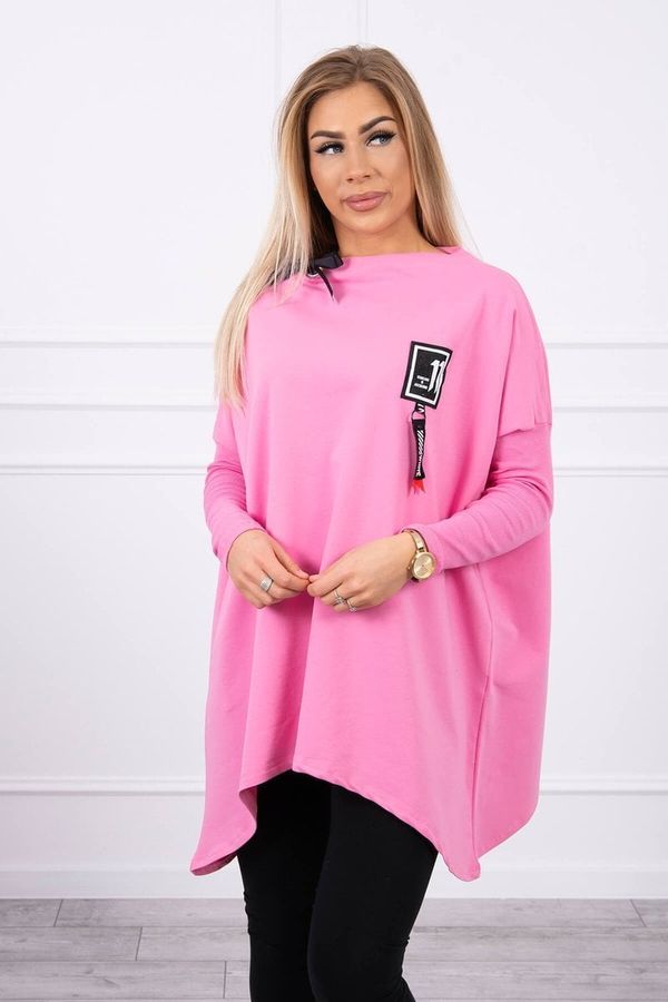 Kesi Oversize sweatshirt with asymmetrical sides of light pink color