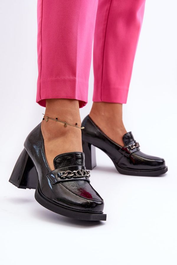 Kesi Patented black Terimene pumps with chunky heels