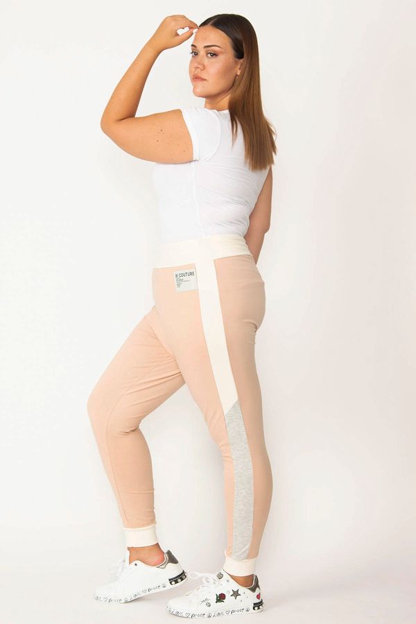 Şans Şans Women's Plus Size Powder Gray Sport Pants with Ribbed Side Stripes and a Wide Belt.