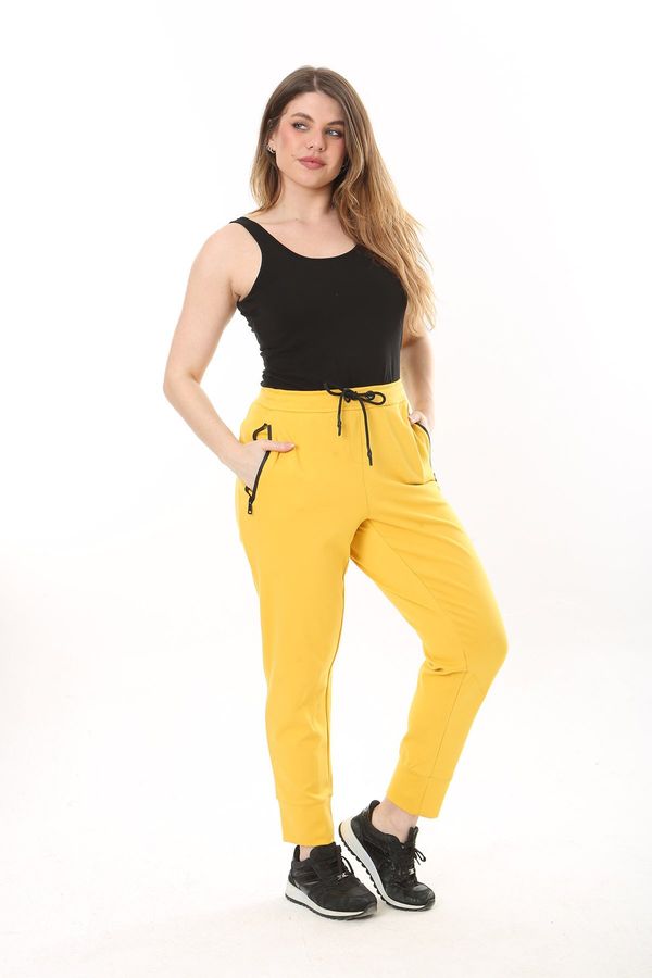 Şans Şans Women's Plus Size Yellow Eyelet Lace Up And Elastic Zippered Pocket Detailed Sports Trousers