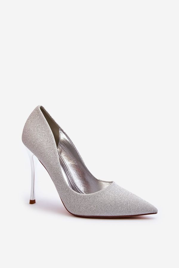 Kesi Tiberon's Shimmering Silver High Heels