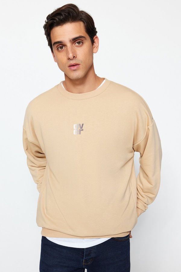 Trendyol Trendyol Beige Men's Oversize/Wide Cut Crew Neck Long Sleeve Text Printed Sweatshirt.