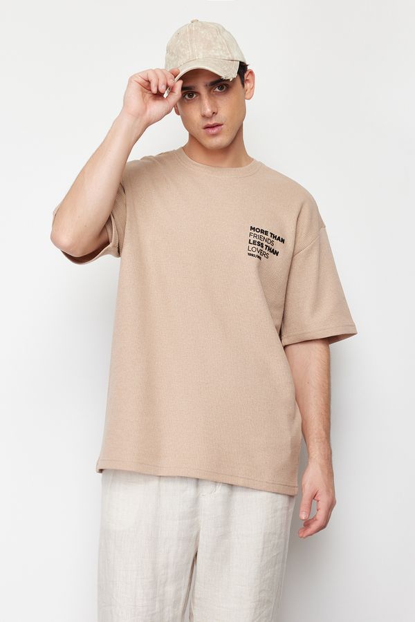 Trendyol Trendyol Beige Oversize/Wide-Fit Ruffle Text Printed Label Textured Waffle T-Shirt