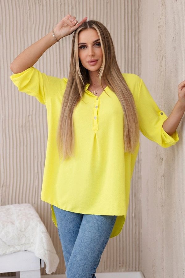 Kesi Women's blouse with a longer back - yellow