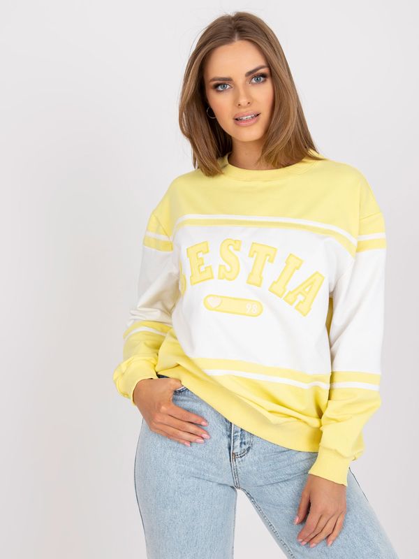 Fashionhunters Yellow and white hoodie with patches