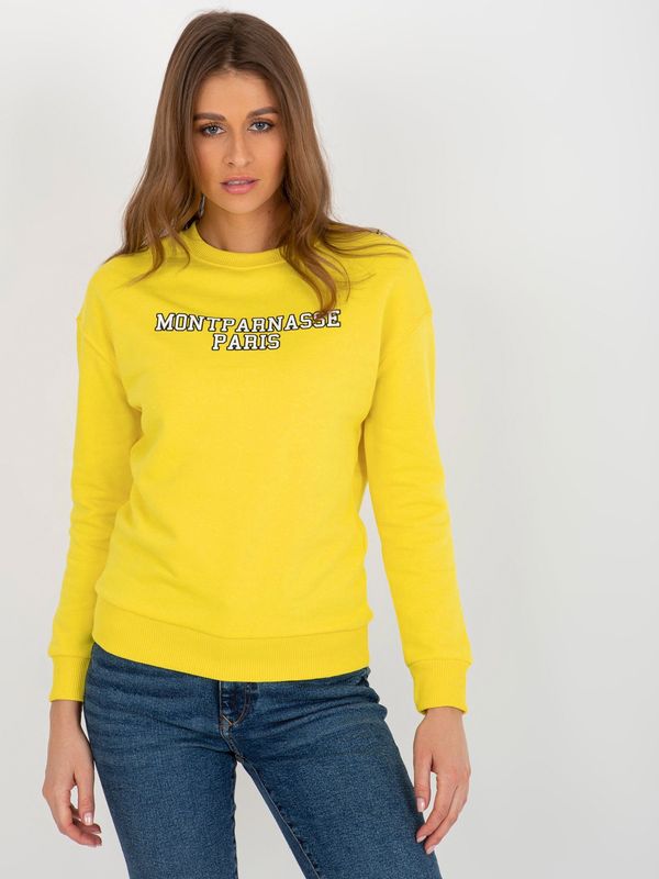 Fashionhunters Yellow hoodie with inscription