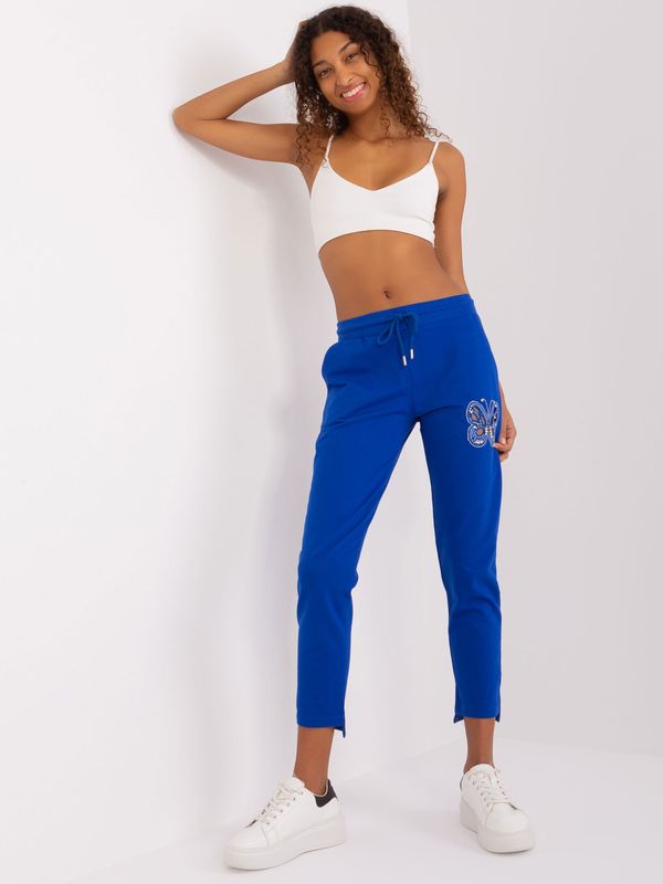 Fashionhunters Cobalt blue sweatpants with appliqués