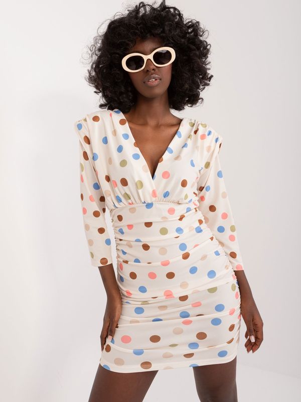 Fashionhunters Cream fitted dress with polka dots