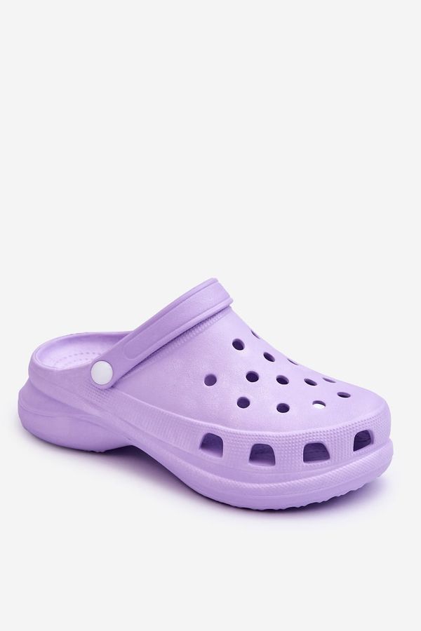 Kesi Crocs foam sandals on a robust Katniss violet sole