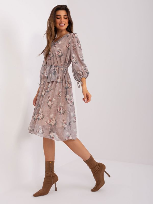 Fashionhunters Dark beige loose dress with floral pattern