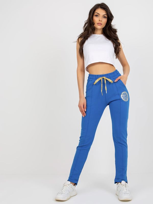 Fashionhunters Dark blue sweatpants with application