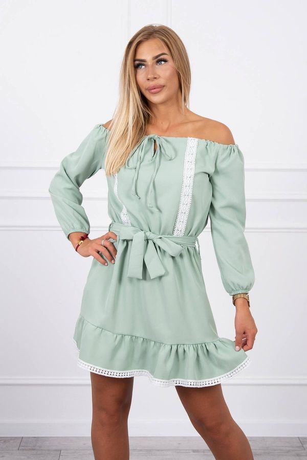 Kesi Dress on shoulders and lace light green