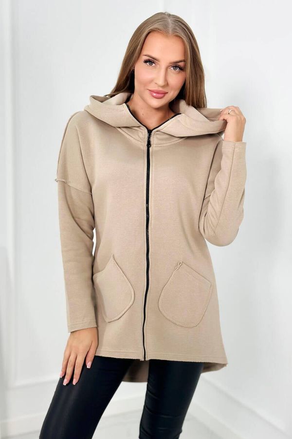 Kesi Insulated sweatshirt with a longer back and pockets light beige