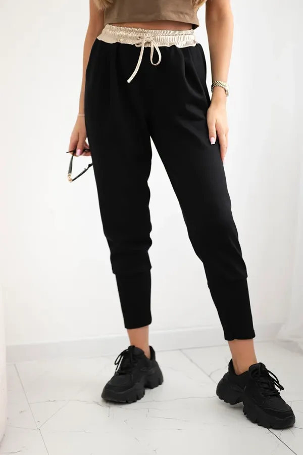 Kesi Włoski Kesi Włoski Butter-soft pants with a golden waistband cuff black