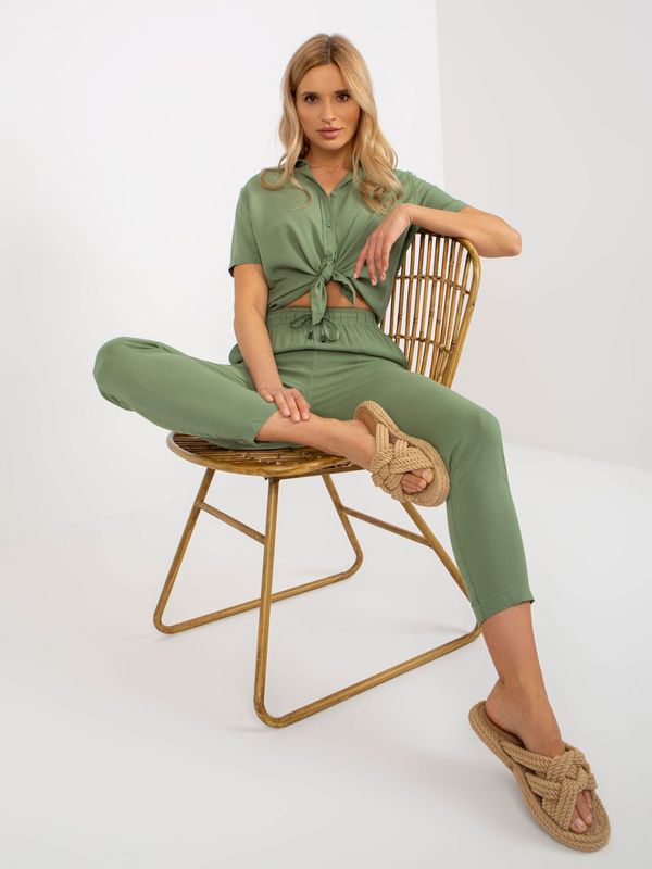 Fashionhunters Khaki trousers made of lightweight fabric with pockets SUBLEVEL