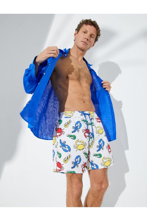 Koton Koton Animal Printed Marine Shorts with a lace-up waist with pocket.