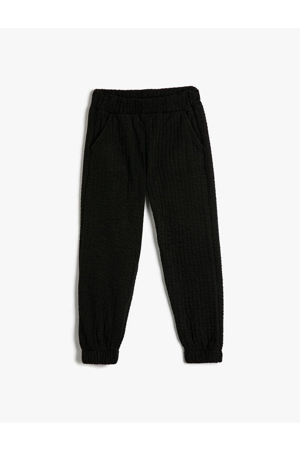 Koton Koton Basic Jogger Trousers. Textured, elastic waist, pockets.
