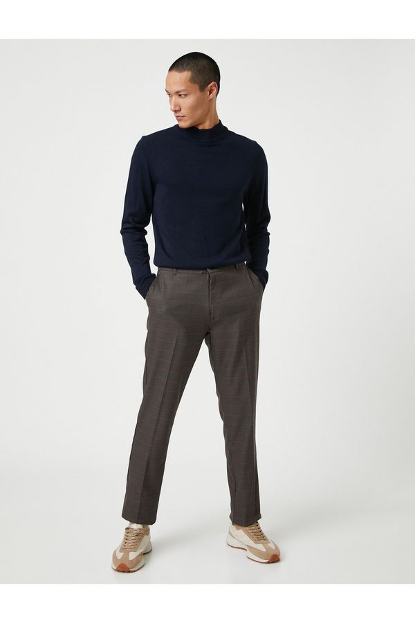Koton Koton Basic Pleated Trousers with Button Detailed Pockets.
