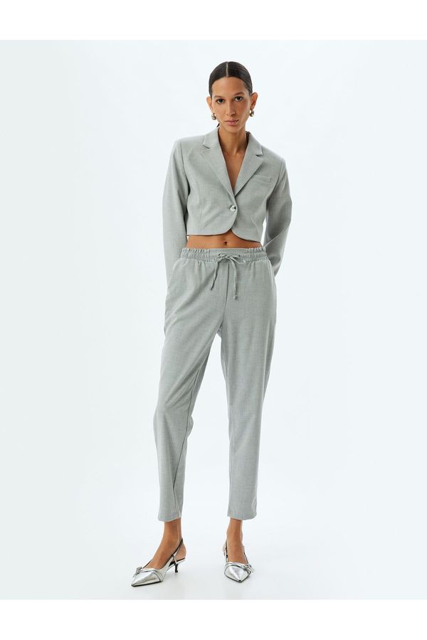 Koton Koton Pocketed Elastic Waist High Waist Jogger Carrot Cut Trousers