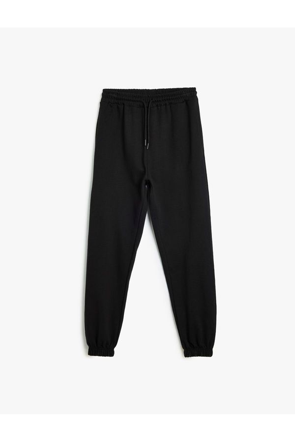 Koton Koton Pocketed Waist Tied Three Thread Jogger Sweatpants