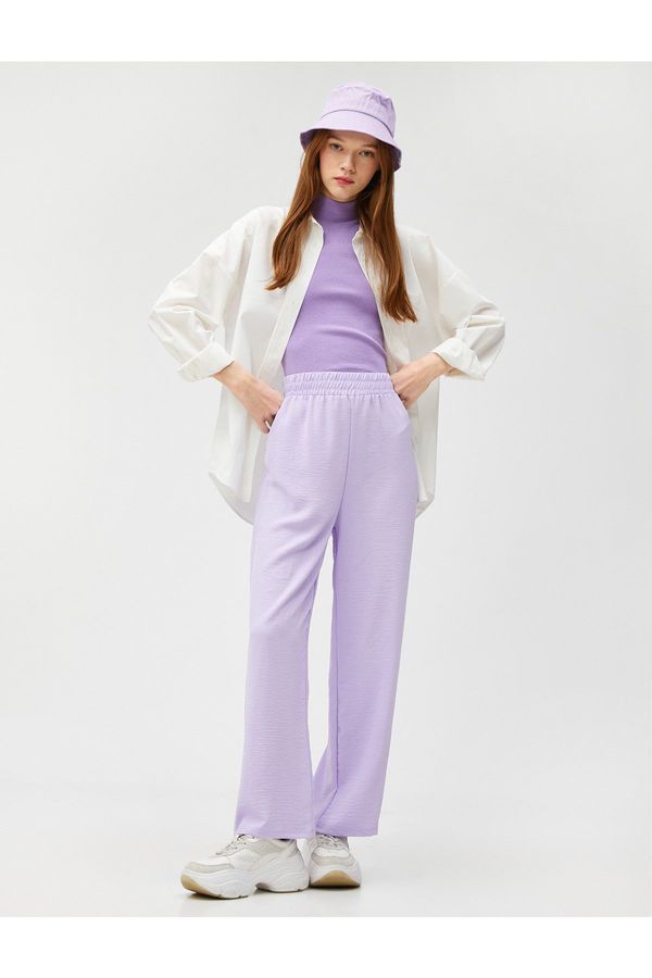 Koton Koton The Wide Leg Trousers have an elasticated waist and relaxed fit.