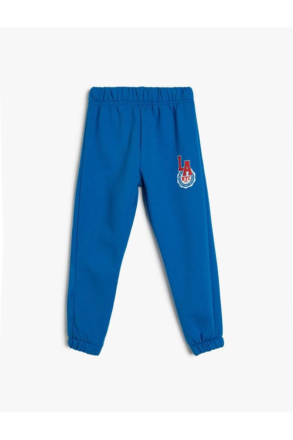 Koton Koton Tracksuit Bottoms with Tied Waist and College Printed Pocket Detail