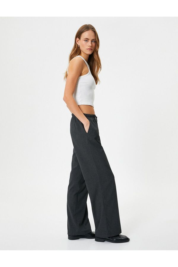 Koton Koton Wide Leg Trousers Tied Waist Relaxed Cut Pocket Detailed