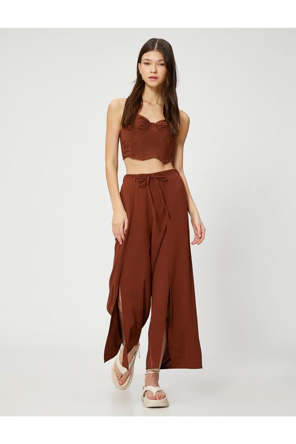 Koton Koton Wide Leg Trousers with Lace-Up Waist and Slit Detail.