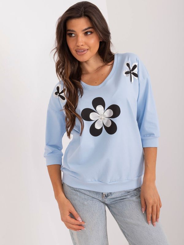 Fashionhunters Light blue cotton blouse with floral print