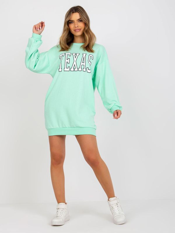 Fashionhunters Light green oversized sweatshirt with print