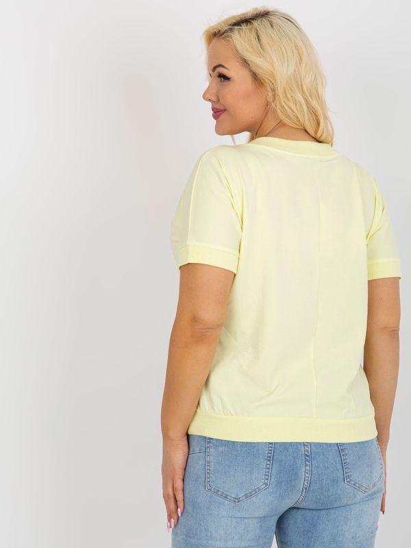 Fashionhunters Light yellow women's blouse plus size with print