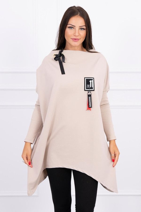 Kesi Oversize sweatshirt with asymmetrical sides of beige color